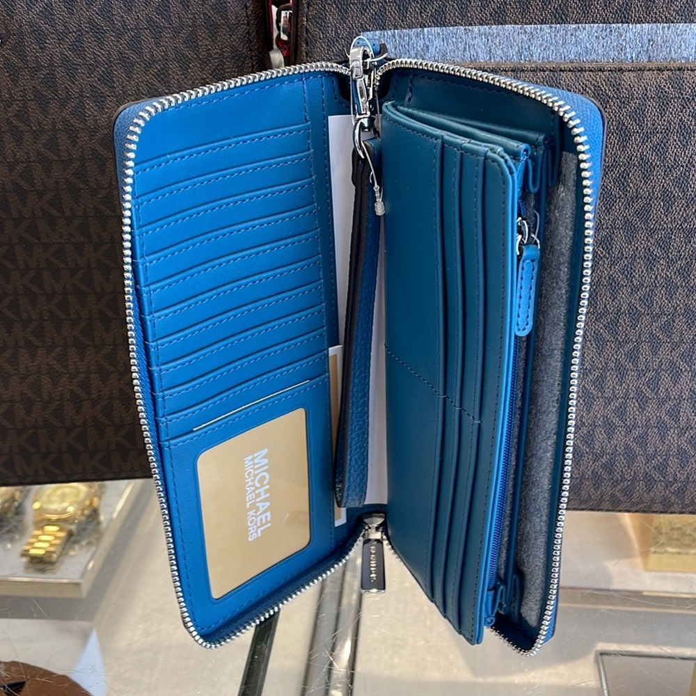 MICHAEL KORS
Leather Continental Wristlet Phone Case Wallet 
Teal
NWT - Picture 13 of 16